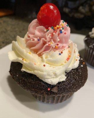 Strawberry and Vanilla Buttercream on Chocolate Cupcake with Cherry on Top