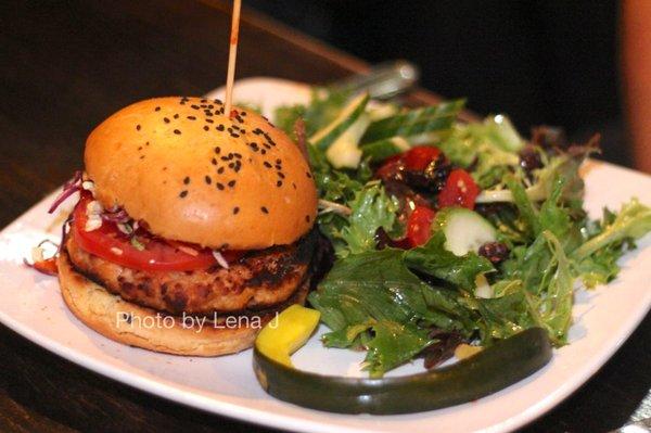 Salmon Burger ($17) - sesame cilantro slaw, tomato, sriracha aioli, toasted sriracha bun