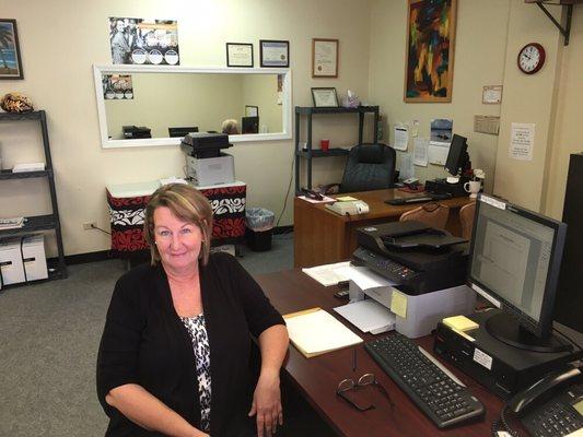 Let Kim help you make an appointment. She keeps the office running