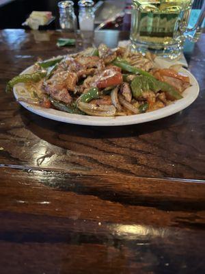 Pollo enquesado (lunch portion) and added grilled veggies (no extra charge).  Good flavor and solid portion for lunch.