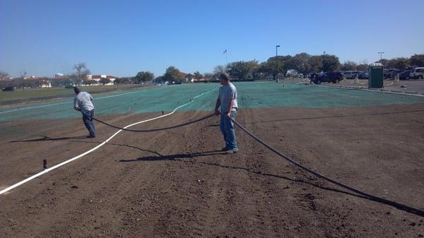 Hydromulching an area of about 8 football fields at Ft. Sam Army Base.