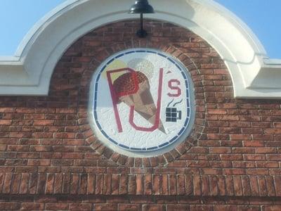 Cool mosaic tile sign hanging over entrance. That must have taken a while!