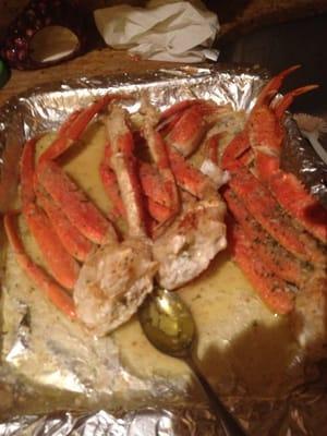 Snow crab legs platter that I broiled lots of butter with bread crumbs