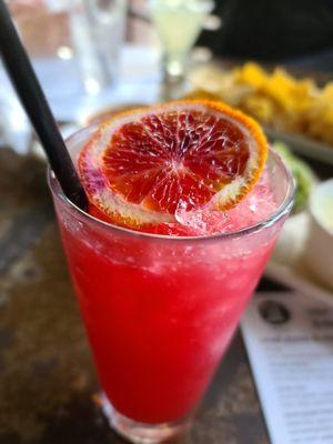 Blood orange lemonade: vodka, fresh blood orange juice, lemon & lime.