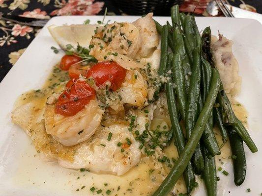 Baked Haddock with Garlic Shrimp, mashed potatoes and green beans.