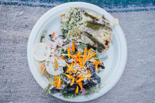 farm to table community meal - asparagus lasagna, little gems with green goddess dressing, seeds and flowers