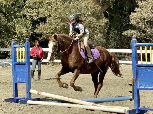 Jumping with coach Marguerite providing guidance!