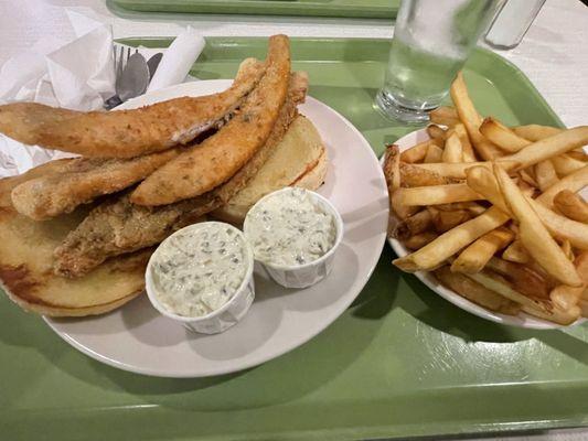 Filet Of Sole Sandwich with side of French fries. They don't pile on the fish like they used to and the fish these days isn't that great.