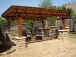 Outdoor kitchen with concrete patio