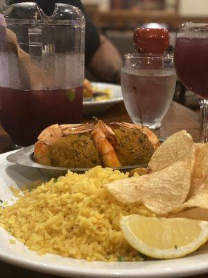 Baked stuffed shrimp with a pitcher of red sangria