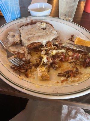 Chicken fried steak with poached eggs. Dug in too fast and almost forgot to take a photo!