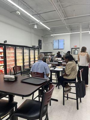 Small food court with take out counter.