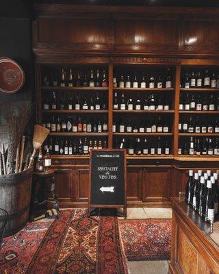 Bustling wine shop, shelves packed with diverse selections for the discerning connoisseur.