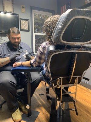 Me getting my tattoo