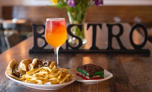 Philly cheesesteak, Moscato Sunrise and Rainbow Cookie