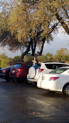 Helpful high schoolers helping me put my sweet noble on the top of my car.