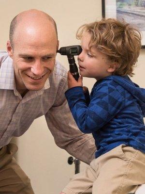 Dr. Ryan Campbell with young patient