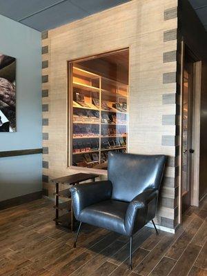 A look into the walk-in humidor from the front seating area.