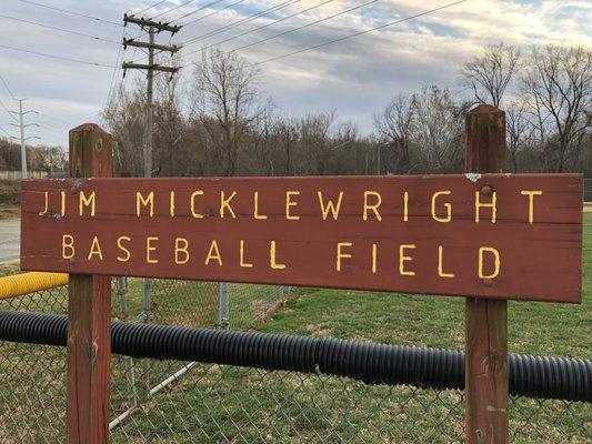 Little League baseball field in the park.