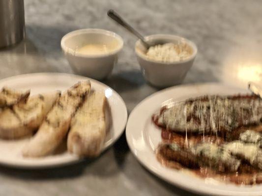 Eggplant Parmesan substituted angel hair for polenta add a side of Alfredo and dip some, pour some and take the remainder home.