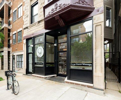 Exterior signage on windows and light-up box sign in window; Glow Birth & Body, Roscoe Village