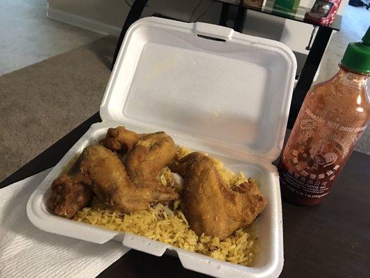 Shrimp fried rice and fried chicken wings