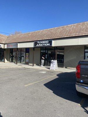 Parking lot view of Tuxedo Junction storefront.