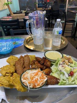 Chicken and salad and plantains and deliciousness