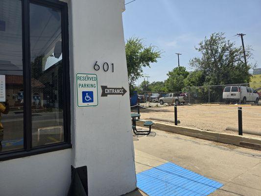 Front side of building for handicap parking spaces eight next to front door.