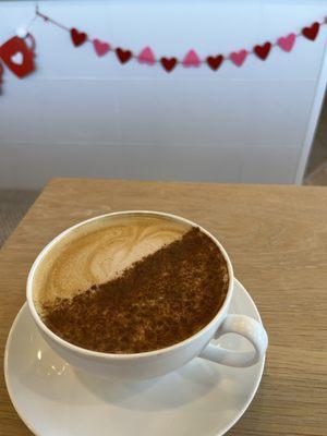 Mocha latte with cinnamon powder