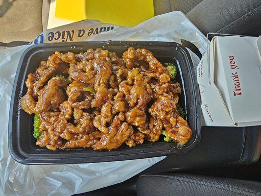 Orange Beef. Comes on bed of broccoli w/ a side of white rice. Similar to the Beijing beef that Panda Express has, but better!