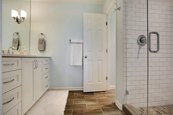 Spacious Designer Bath with large walk in shower to start your day