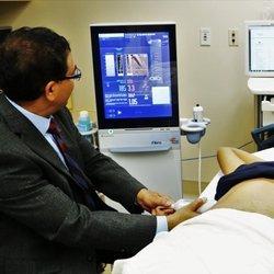 FibroScan is being performed by Dr. Muhammad Sheikh to assess fat and fibrosis in the liver.