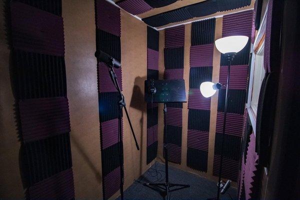 Vocal booth can fit up to three persons.