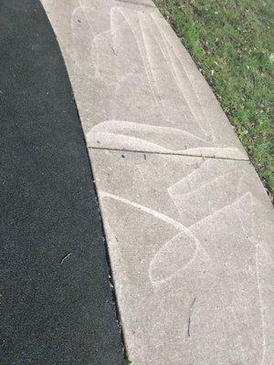 Poorly power washed sidewalks.