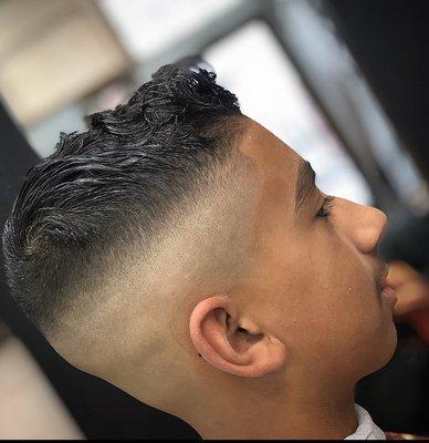 Skin tight fade with some scissor work up top