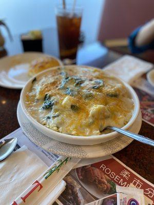 Baked sole fillet with spinach over rice