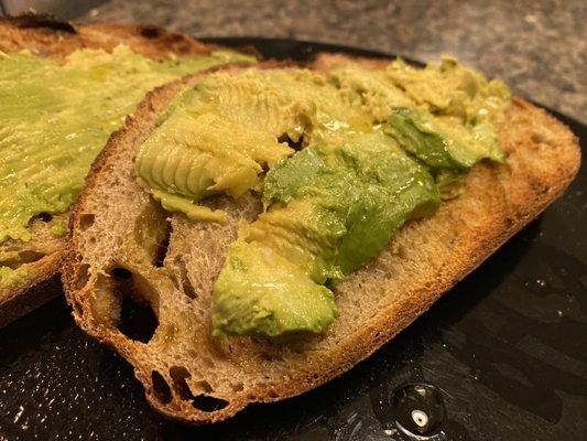 Sourdough toasted at home with avocado and some oil/salt. Everything I want from a sourdough loaf!