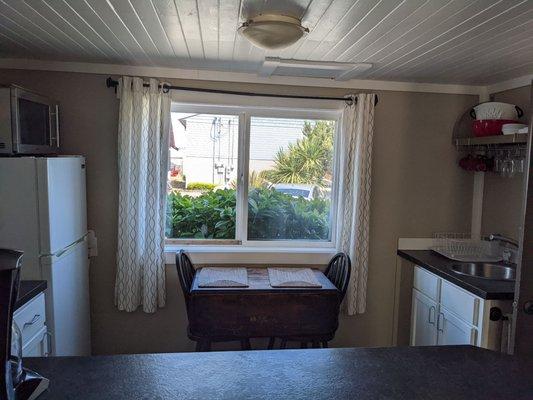 Kitchen and counter with stools