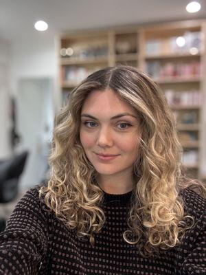 Natural Curls accented with some softer curls after a Signature cut & highlights.