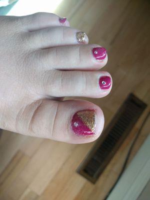 Bubbles in polish (both big toe and middle toe.) $40 including tip. :0(