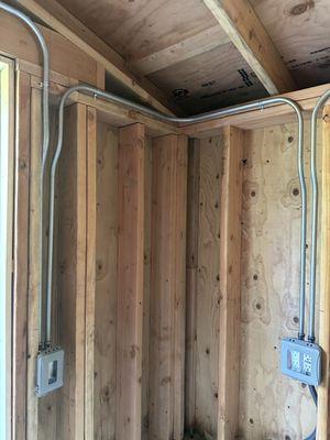 Garden shed conduit / Woodside