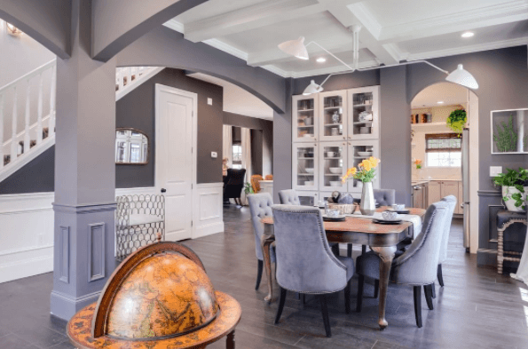 How gorgeous is this dining room featuring our Architexture hardwood flooring with ArmorMax finish in Cappuccino Oak.