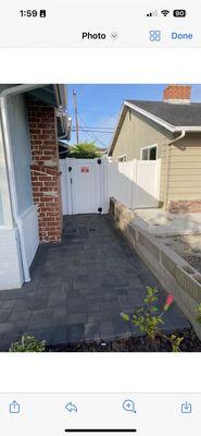 Sanded down chimney paint and new pavers with drain to the street