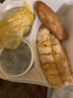 The "alleged" blacked fish , green beans and corn on the cob with a breadstick.