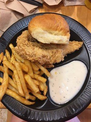 Chicken tender mea with fries.