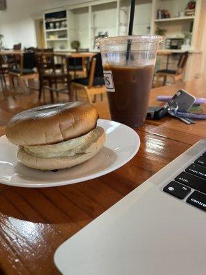 Bagel with provolone and egg; Iced coffee with sugar free mocha syrup and oat milk