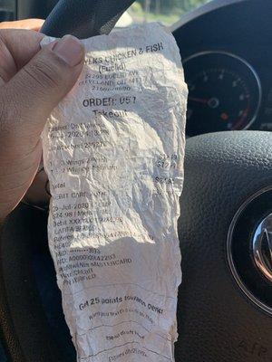 Receipt and nasty food with an eyelash in it