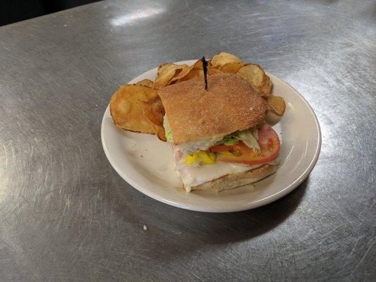 Daily sandwich specials with homemade bread, and homemade chips on the side.