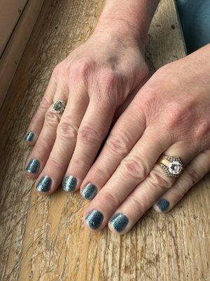 Her nails in Montana Saphire color!